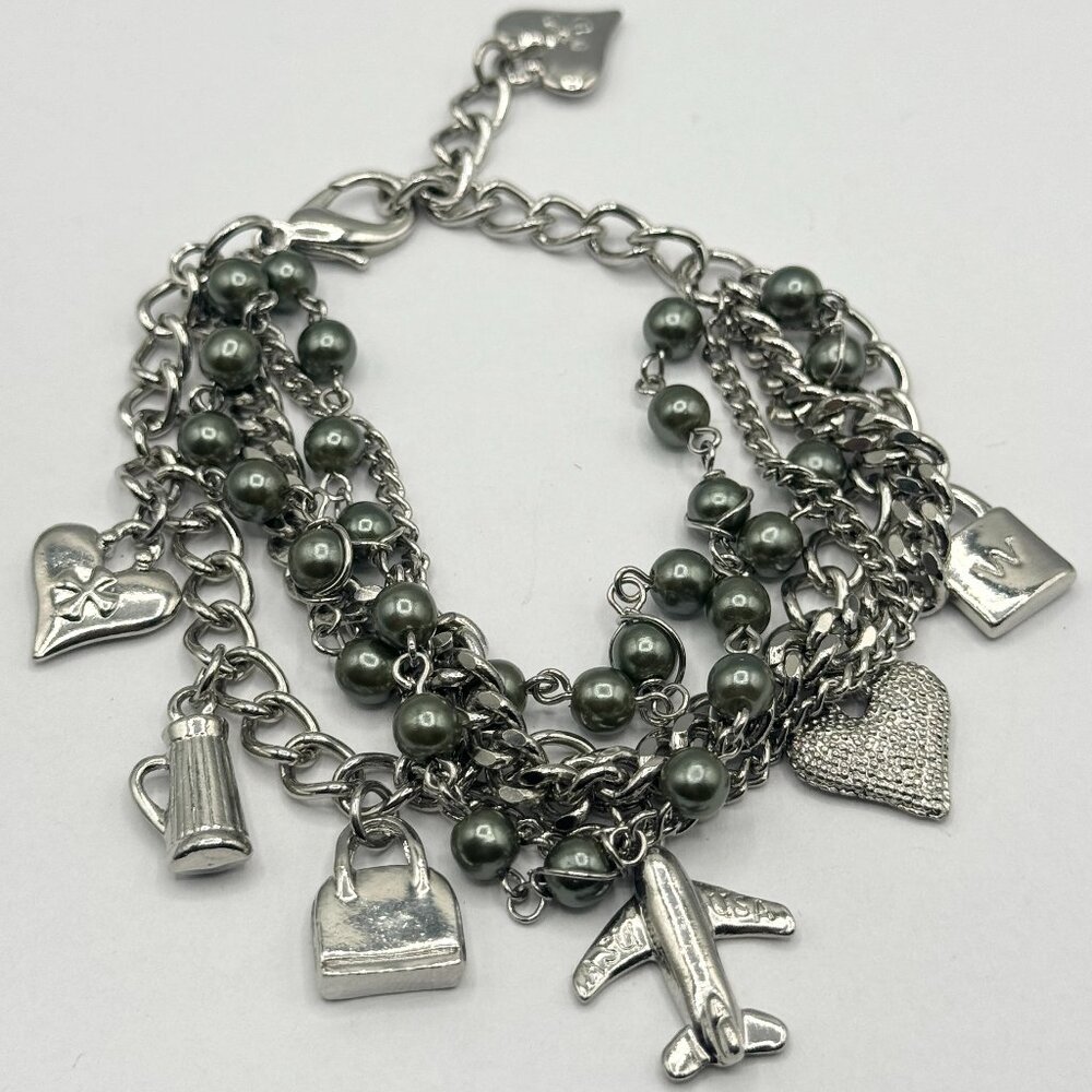 Silver Pearl Multi Chain Charm Bracelet. Silver tone chains with hanging silver